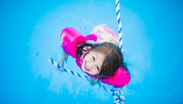 A young swimmer in the spring-fed pool