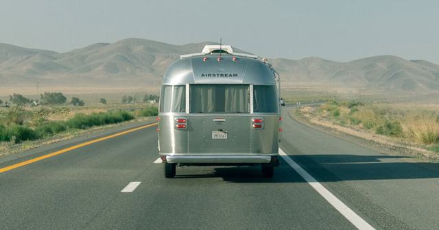 An RV parked at the top of the canyon